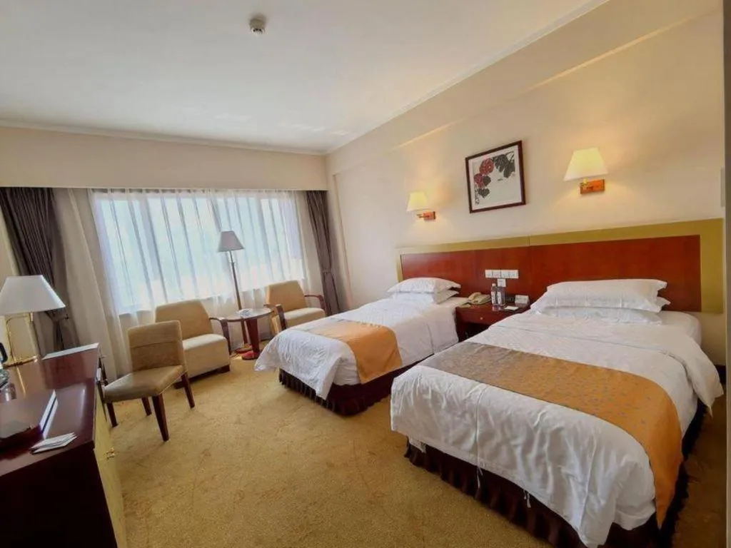 Bed in Kunming Jinjiang Hotel