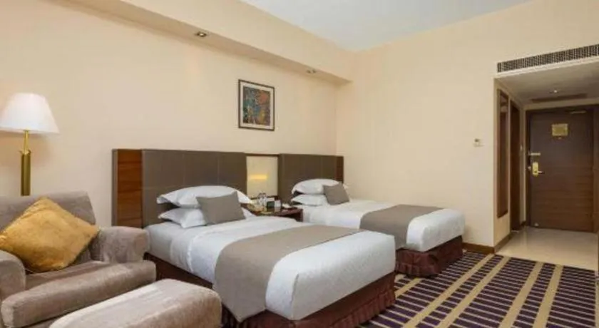 Bed in Kunming Jinjiang Hotel