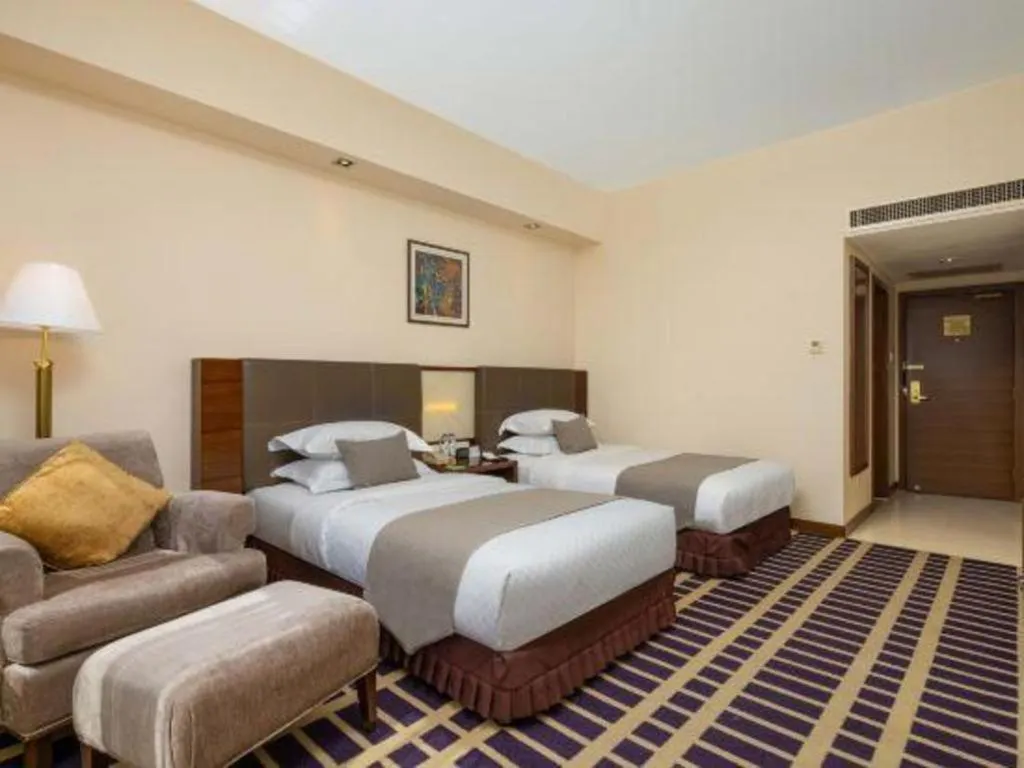 Bed in Kunming Jinjiang Hotel