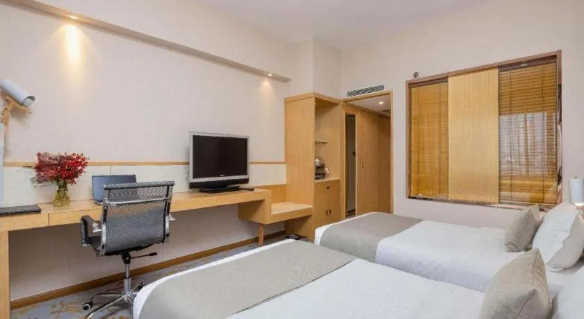 Bed in Kunming Jinjiang Hotel