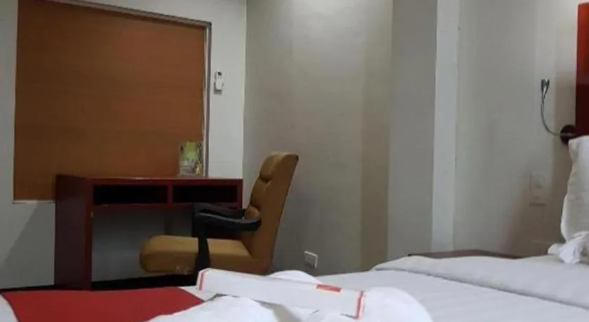 Bed in Cherry Midtown Hotel