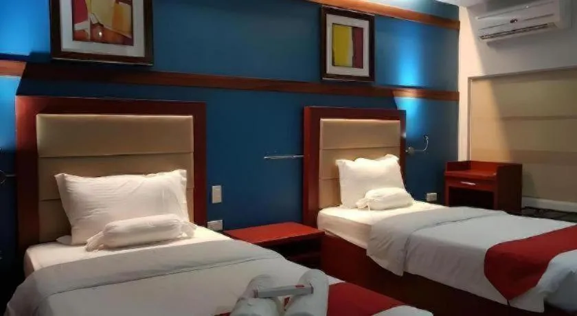 Bed in Cherry Midtown Hotel