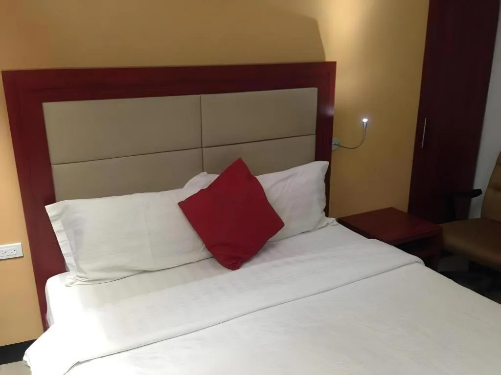 Bed in Cherry Midtown Hotel