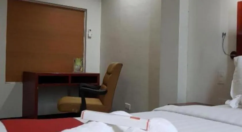 Bed in Cherry Midtown Hotel