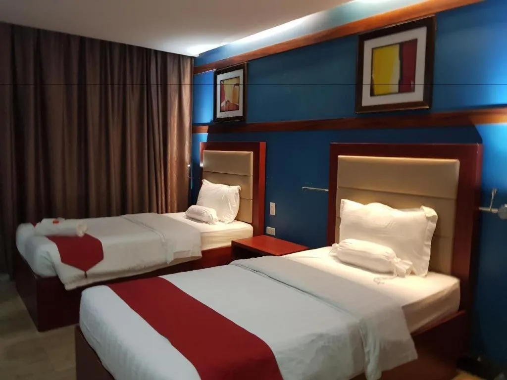 Bed in Cherry Midtown Hotel