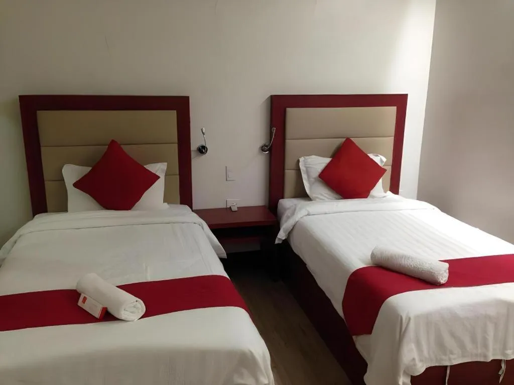 Bed in Cherry Midtown Hotel