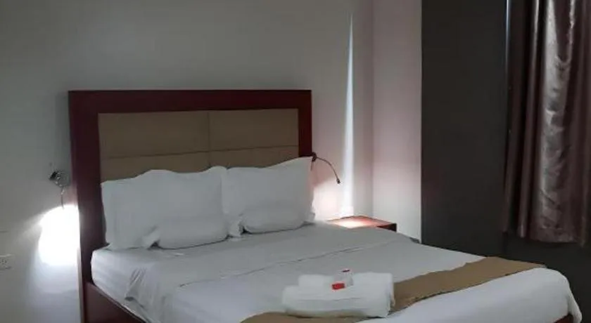 Bed in Cherry Midtown Hotel