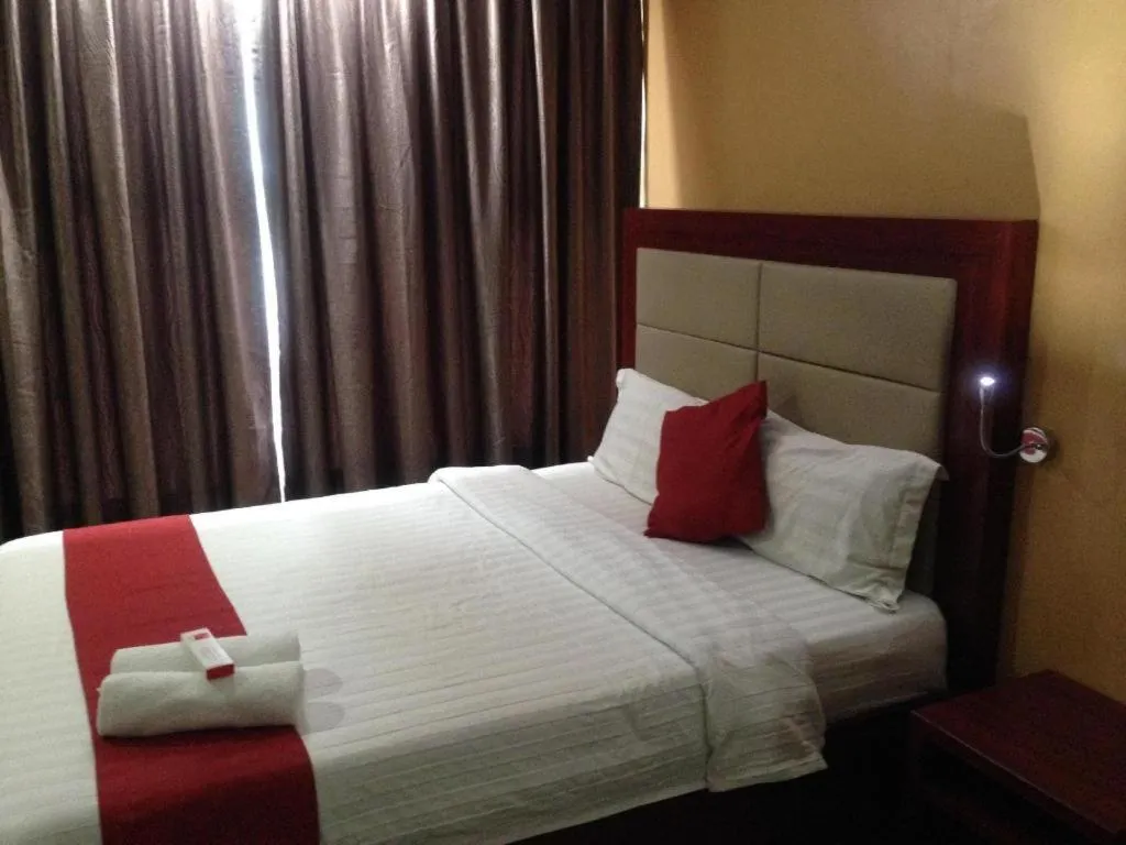 Bed in Cherry Midtown Hotel