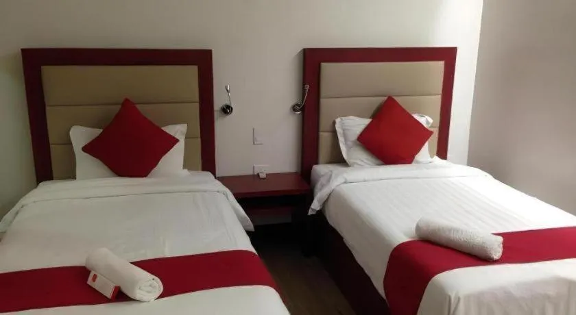 Bed in Cherry Midtown Hotel