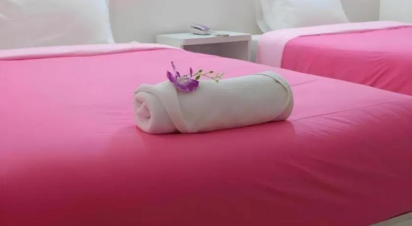 Bed in Wiangphumin Hotel