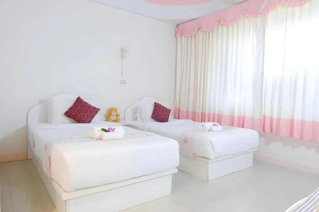 Bed in Wiangphumin Hotel