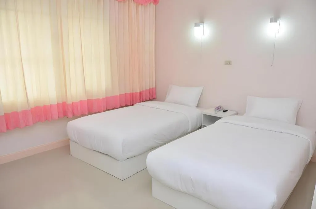Bed in Wiangphumin Hotel