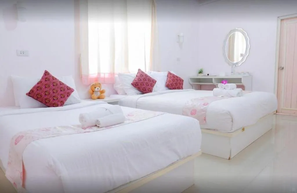 Bed in Wiangphumin Hotel