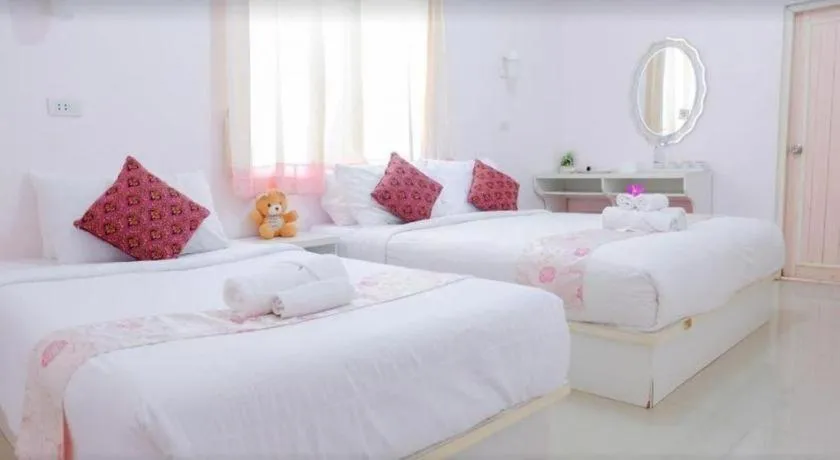 Bed in Wiangphumin Hotel