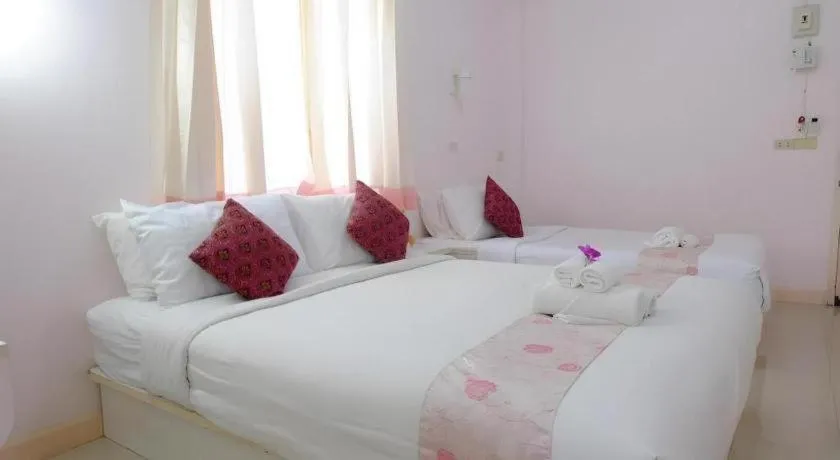 Bed in Wiangphumin Hotel