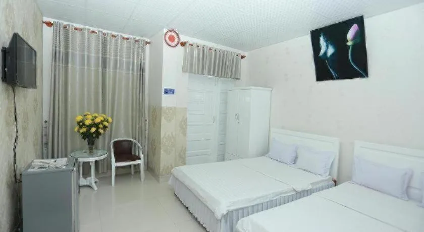 Bed in Thanh Long Hotel