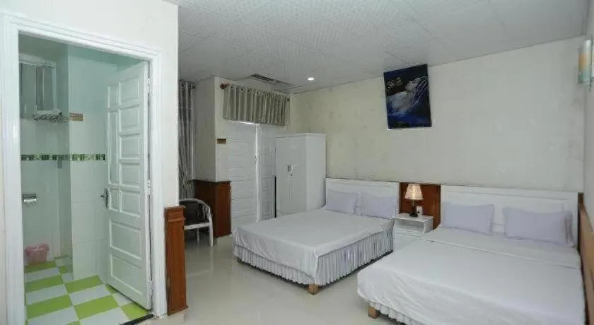 Bed in Thanh Long Hotel