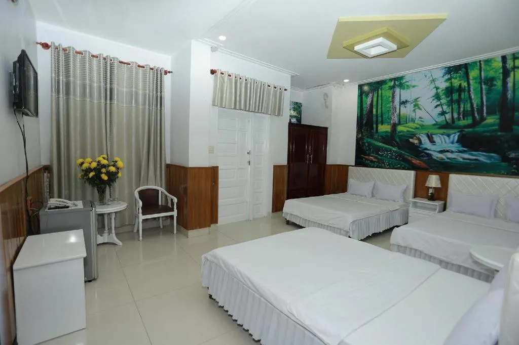 Bed in Thanh Long Hotel