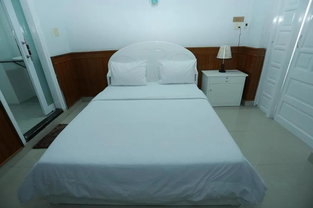 Bed in Thanh Long Hotel