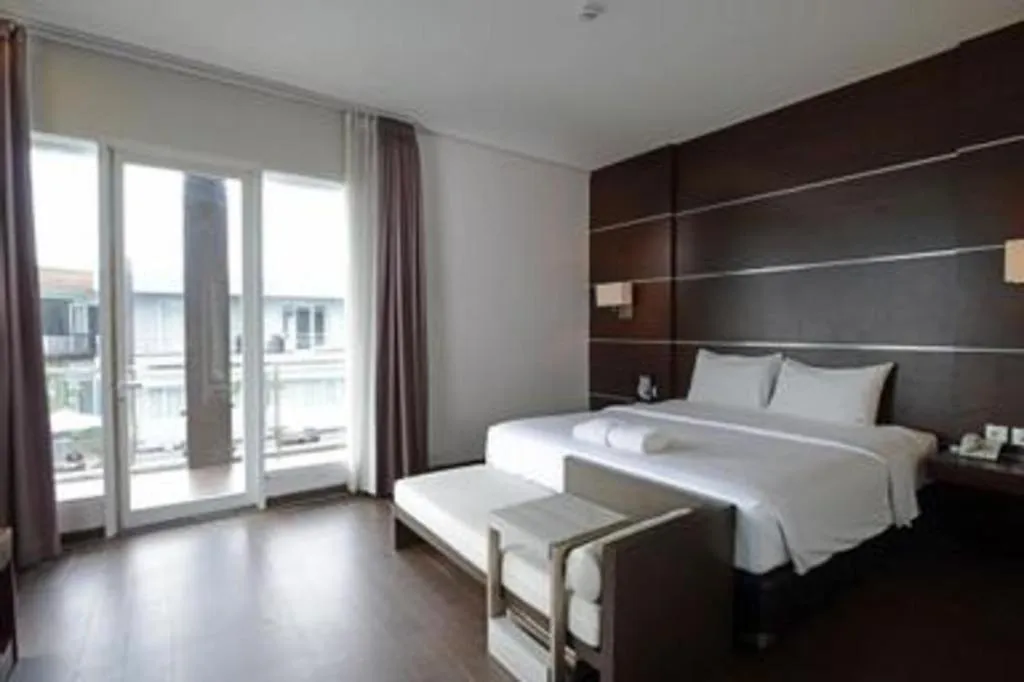 Bed in D'Season Premiere Hotel