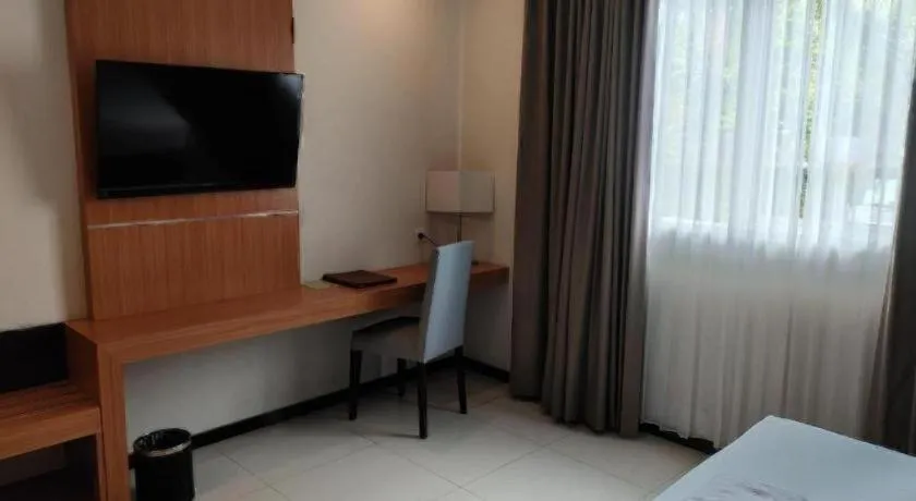 Bed in D'Season Premiere Hotel