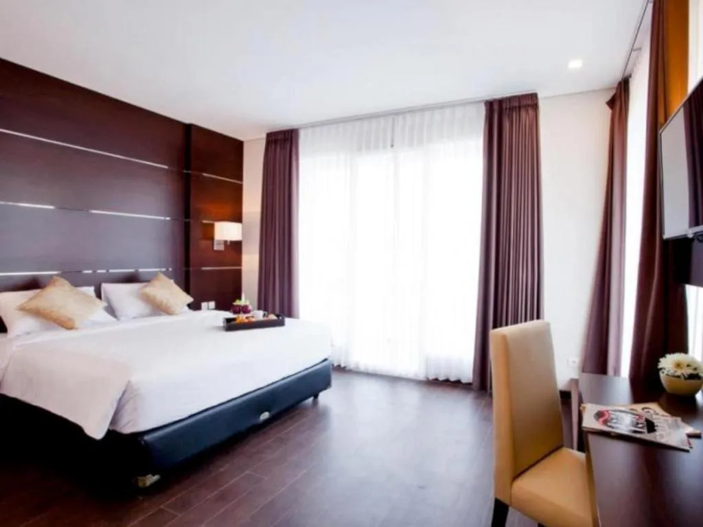 Bed in D'Season Premiere Hotel