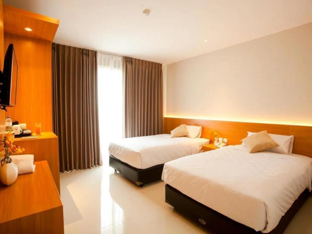 Bed in D'Season Premiere Hotel