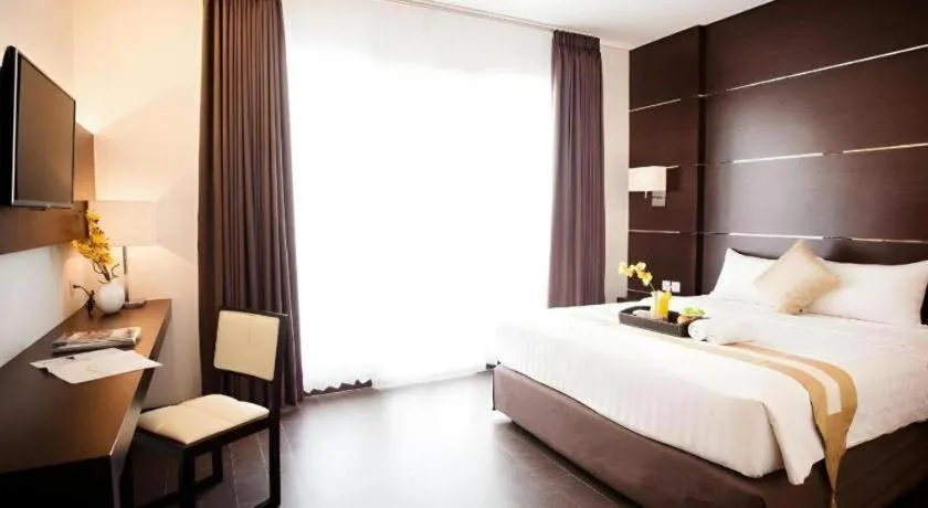 Bed in D'Season Premiere Hotel