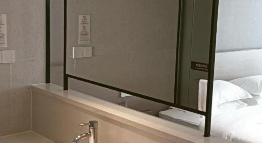 Bed in Grand Nest Hotel (Tang Jia Wan Beach)