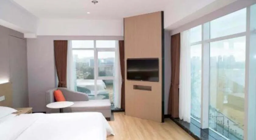 Bed in Grand Nest Hotel (Tang Jia Wan Beach)