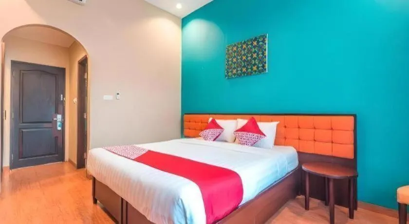 Bed in Ole Suite Hotel