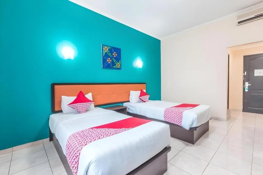 Bed in Ole Suite Hotel