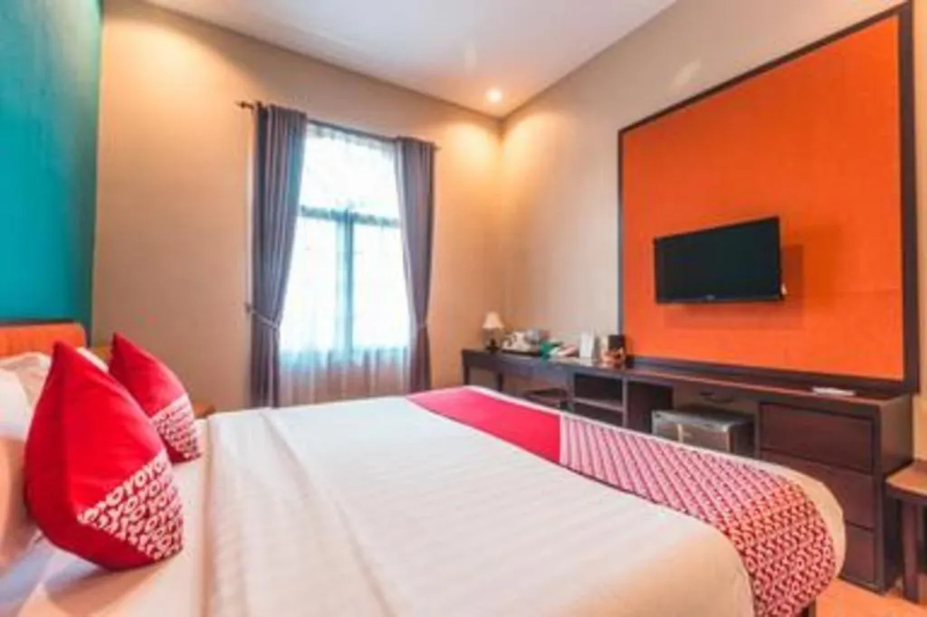 Bed in Ole Suite Hotel