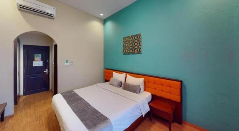 Bed in Ole Suite Hotel