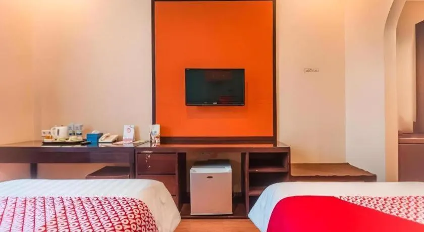 Bed in Ole Suite Hotel