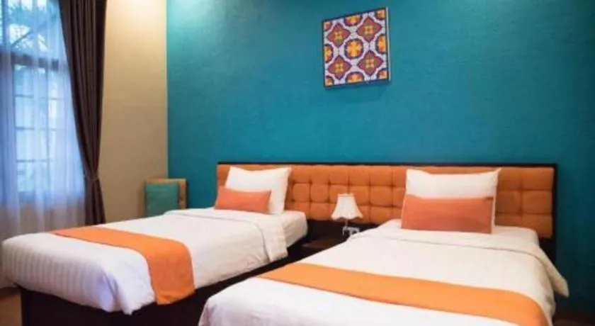 Bed in Ole Suite Hotel