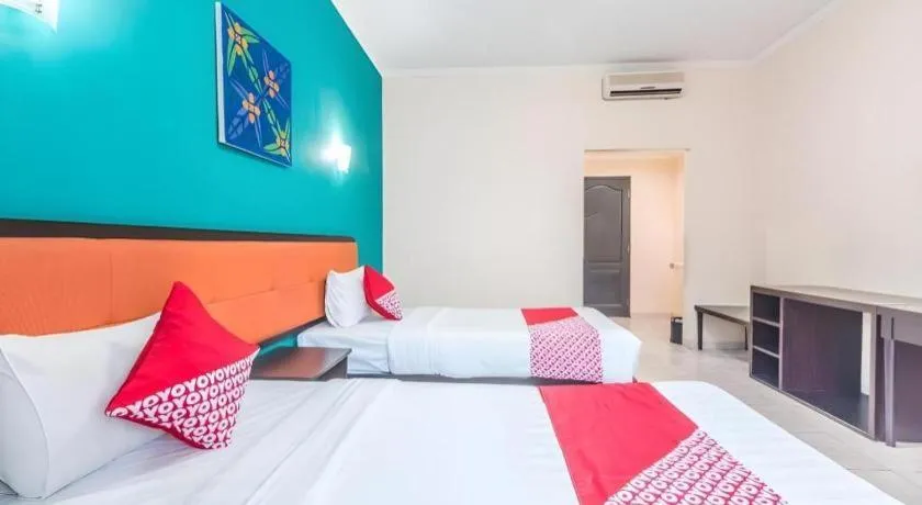 Bed in Ole Suite Hotel