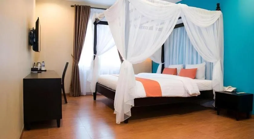 Bed in Ole Suite Hotel