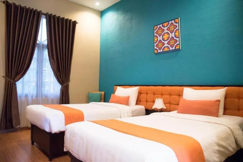 Bed in Ole Suite Hotel