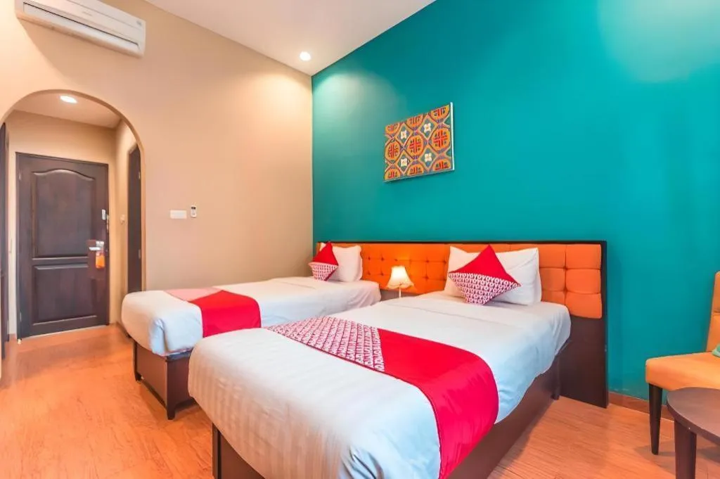 Bed in Ole Suite Hotel