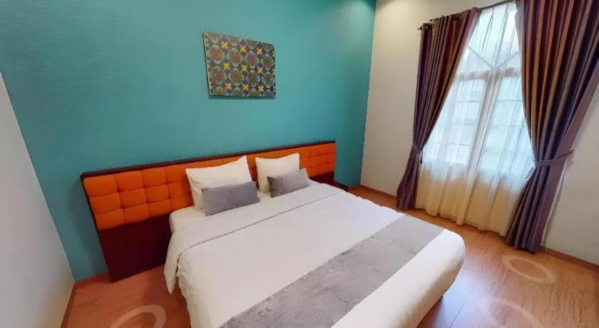 Bed in Ole Suite Hotel