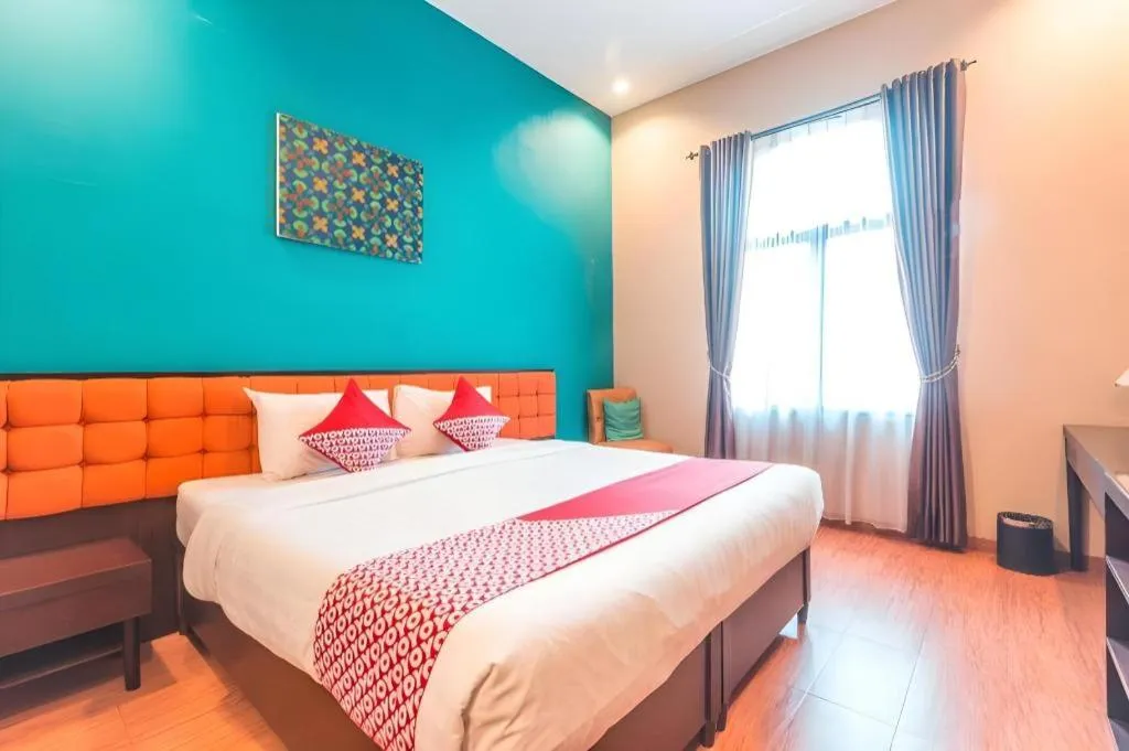 Bed in Ole Suite Hotel