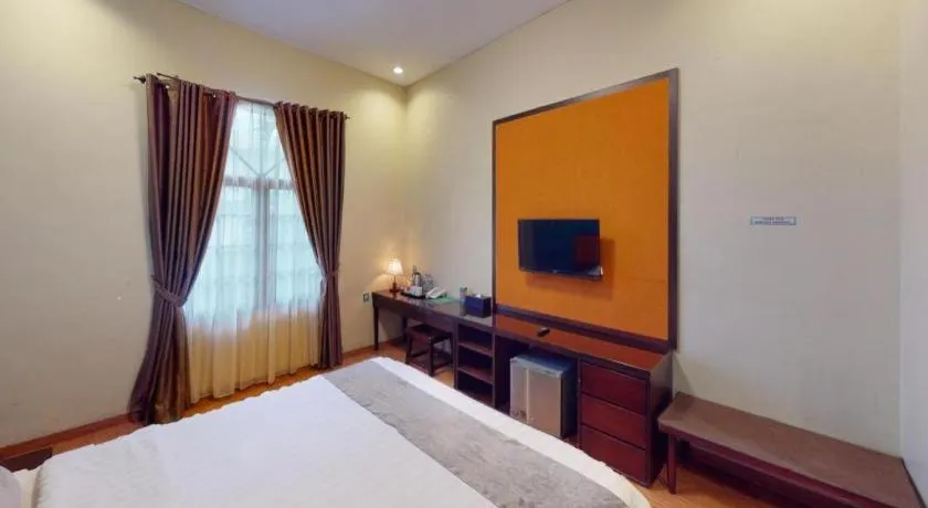 Bed in Ole Suite Hotel