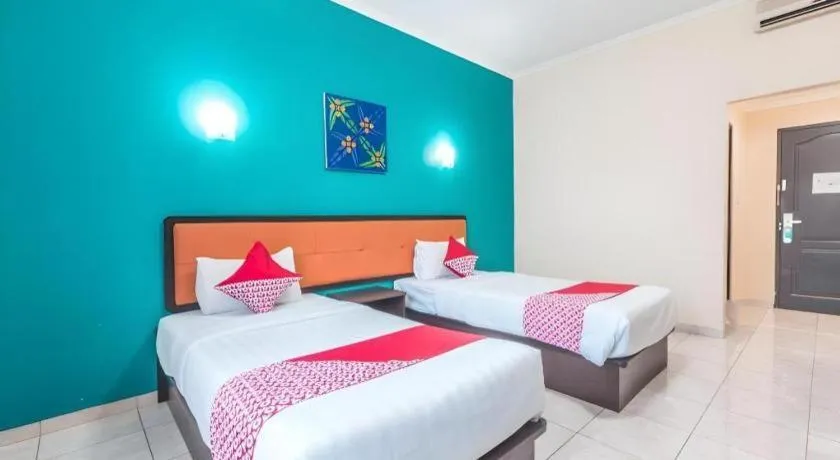 Bed in Ole Suite Hotel