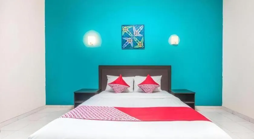 Bed in Ole Suite Hotel