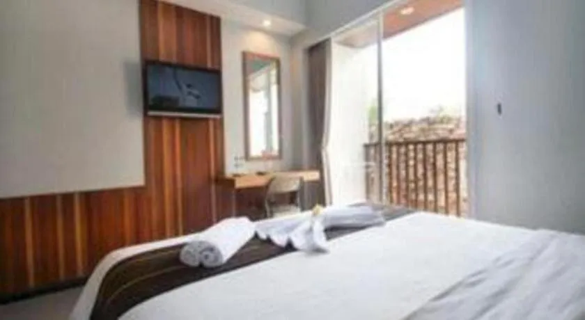 Bed in Hadi Poetra Hotel