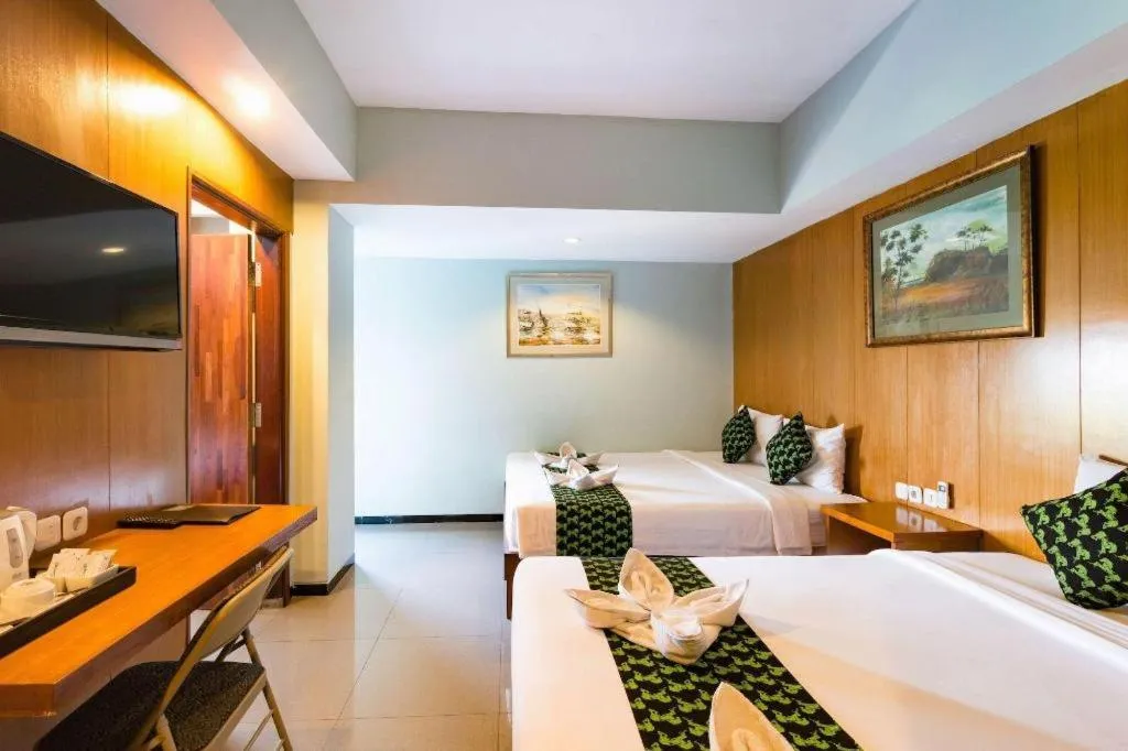 Bed in Hadi Poetra Hotel