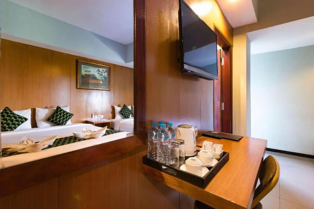 Bed in Hadi Poetra Hotel