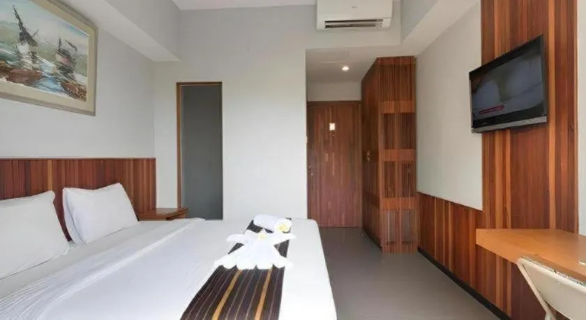 Bed in Hadi Poetra Hotel