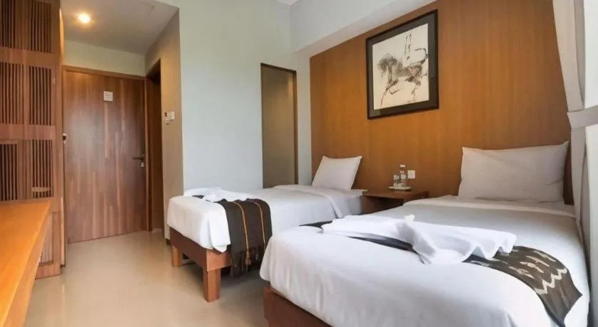 Bed in Hadi Poetra Hotel